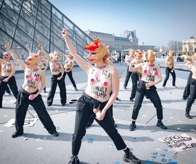 Ativistas protestam com máscaras de porco diante do Louvre contra impunidade no caso Epstein