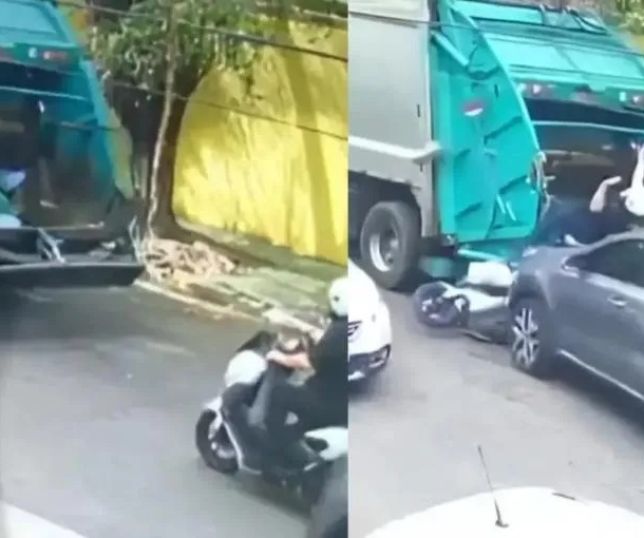 Motociclista é arremessado em colisão e cai dentro de caminhão de lixo.  VEJA VÍDEO