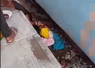 Vídeo de mãe protegendo filhos em trilhos de trem choca a internet e gera debate nas redes sociais. VEJA AS IMAGENS