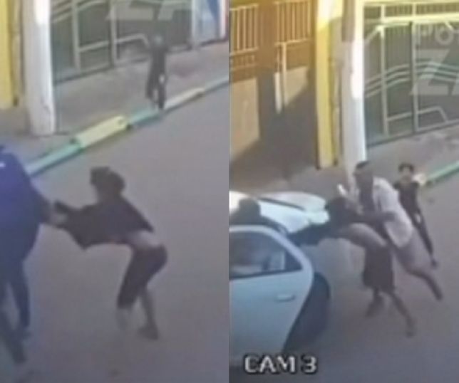 Câmera de segurança registra criminoso tentando arrastar criança para dentro de táxi, mas homem age rápido e salva o garoto. VEJA VÍDEO