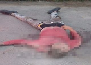 IMAGEM FORTE! Corpo de homem com visíveis sinais de tortura, tiros e facadas é encontrado no bairro Tarumã, Zona Oeste de Manaus